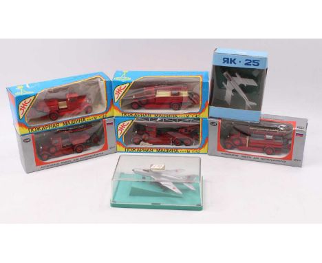 Seven Mixed scale boxed Russian diecast to include; 1937 red fire engine, CY-7 Supersonic fighter MIG-21 and others