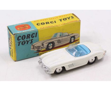 A Corgi Toys No. 303 Mercedes Benz 300SL Open Roadster, in white body with light blue interior and silver hubs, housed in the