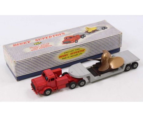 A Dinky Toys No. 986 Mighty Antar low loader with propeller comprising red tractor unit with grey trailer and plastic propell