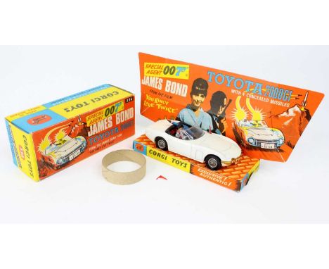 Corgi Toys No. 336 James Bond's Toyota 2000 GT comprising of white body with black interior, with 2 figures, wire work hubs w