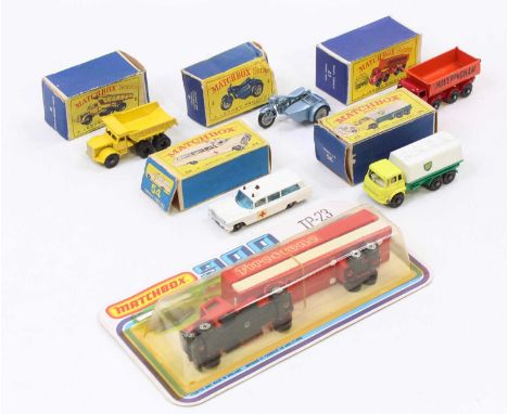 A collection of boxed and carded Matchbox diecast vehicles to include a Matchbox 900 TP-23 Firestone articulated tractor unit