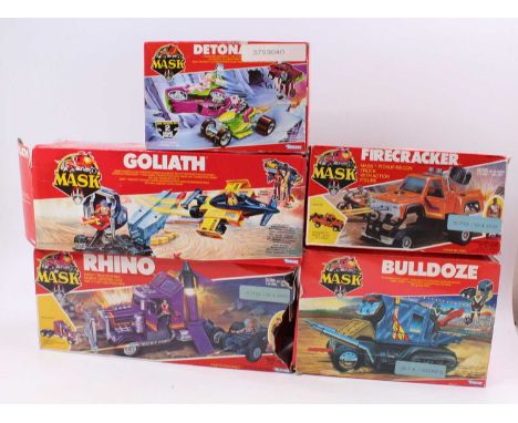 A collection of boxed Kenner Mask vehicles and accessories to include Firecracker, Bulldoze, Detonator, Rhino and Goliath, al