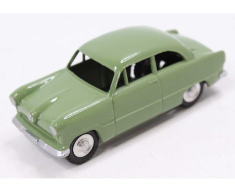 A Marklin No. 5524/4 Ford Taunas 15M comprising green body with silver detailed headlights and bumper, fitted with spun hubs,