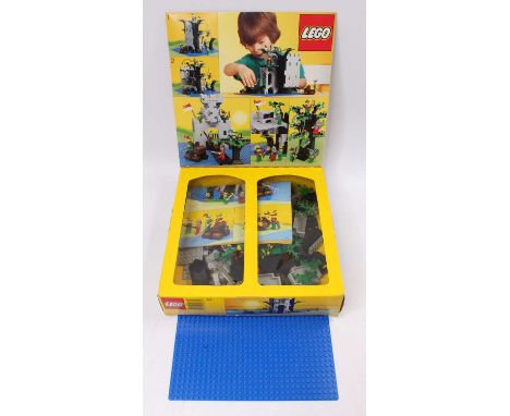 A Vintage Lego No. 6077 Forest Mens River Fortress, housed in the original window display box, with base plate and instructio