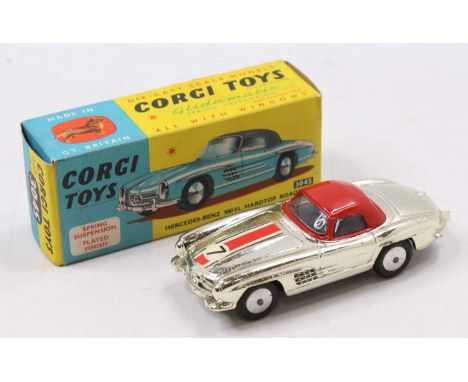 A Corgi Toys No. 304S Mercedes Benz 300SL hard top roadster, in silver metallic body, with red and white stripe No. 7, and re