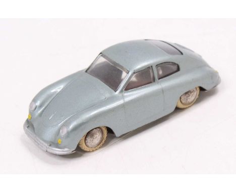 A Tekno of Denmark No. 803 Porsche 356 comprising metallic light silver body with chrome hubs complete with white tyres, loos