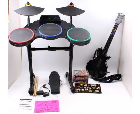 A Guitar Hero for Playstation 3 bundle to include Drum Kit, Les Paul, Foot pedal and drumsticks, along with the games Guitar 