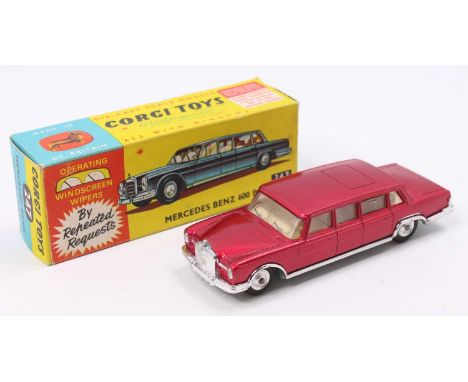 Corgi Toys No. 247 Mercedes Benz 600 Pullman comprising of metallic red body with cream interior and spun hubs housed in the 