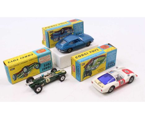 A Corgi Toys group of three to include Corgi 330 Porsche Carrera 6 in white and red with driver figure, along with a Corgi 33