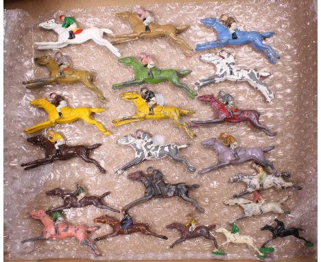 A collection of Chad Valley and similar lead hollow cast European jockeys and horses, 14 complete, 7 examples with faults, so