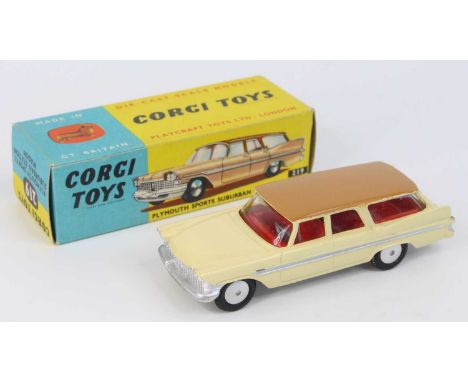 Corgi Toys No. 219 Plymouth Sports Suburban station wagon comprising of cream body with brown roof, light tan base, and red i