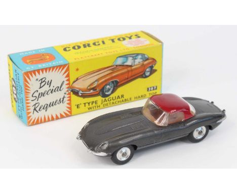 Corgi Toys No. 307 E-type Jaguar E Type with detachable hard top comprising of metallic dark grey body with brown interior an