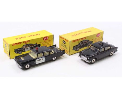 A Dinky Toys group of two to include a Dinky 258 U.S.A. Police Car with black body with white door fronts, "Police" on doors,