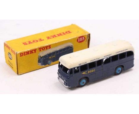 Dinky Toys No. 283 BOAC coach comprising dark blue &amp; white body with light blue hubs, in the original all-card box (VG-BV