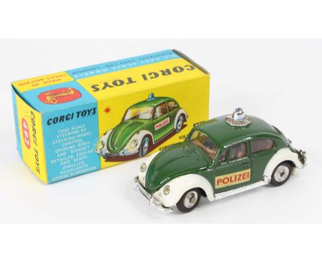 Corgi Toys No. 492 Volkswagen Beetle European police car comprising of dark green and white body with blue roof light and two