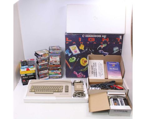 A Commodore 64C Light Fantastic Console, together with a quantity of mixed games and cassettes