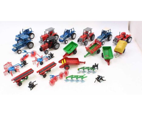 Two trays containing a quantity of various Lonestar and Crescent agricultural and tractor diecast vehicles and accessories to
