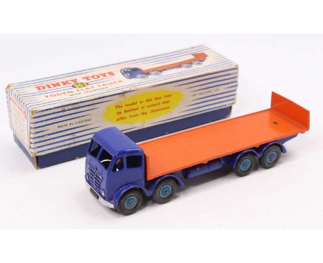 A Dinky Toys No. 903 second type Foden flat truck with tail board comprising dark blue cab &amp; chassis with light blue hubs
