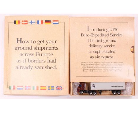 A Matchbox 1980s UPS Euro Expedited Service Promotional Pack containing a brown UPS tractor unit with United Parcels Service 