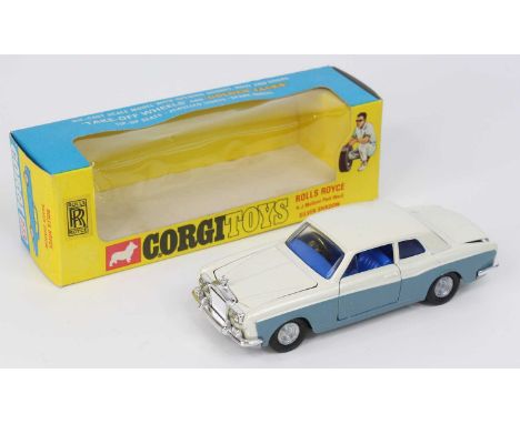 Corgi Toys, 273 Rolls Royce Silver Shadow, with golden jacks, pearlescent white upper, grey lower, blue interior, with model 