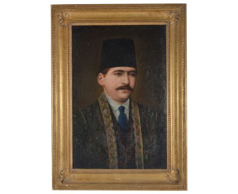 Qajar School (19th/20th century):Portrait of a notable Iranian gentleman, oil on canvas, H 51.5 x W 33.5 cm