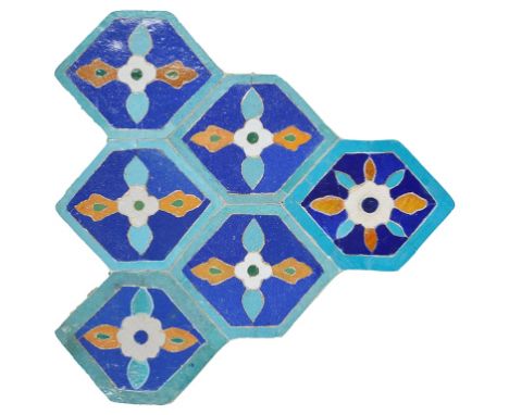 A Hexagonal Timurid Ceramic Tile:Central Asia, 13th-14th century A.D., outlined in turquoise, the panels inset with white, go