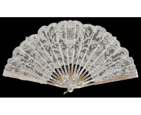 A Fan, Circa 1900, from The Collection of H.R.H. The Princess Margaret:    The leaf of fine Honiton lace worked with palmette