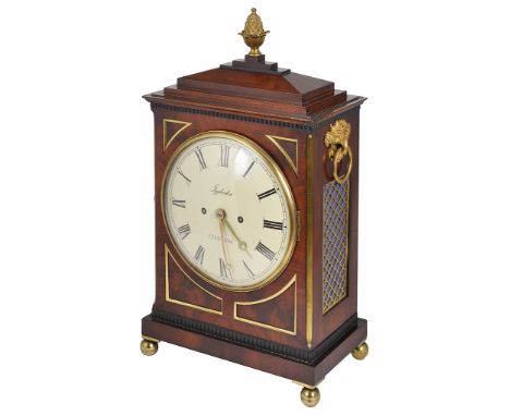 A Bracket Clock by Igglesden of Chatham:Large Mahogany architectural case, with gilt Pineapple finial, Cornucopia ring handle