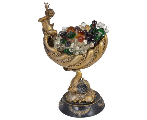A 20th Century Gilt Metal Lamp of a Cherub on a Shell Boat:A stylish Continental table lamp modelled as a cherub holding a tr