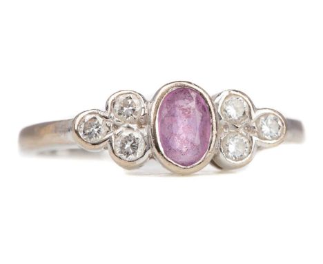 RUBY AND DIAMOND DRESS RING,the oval ruby flanked by round brilliant cut diamonds totalling approximately 0.18 carats, in eig