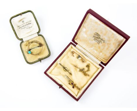 Five antique brooches, one diamond and pearl set hunting horn in 18 ct, another seed pearl set cross with crown, stamped 15 c