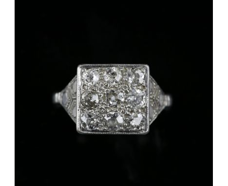 1930's diamond ring, set with nine old cut diamonds, estimated total diamond weight 0.80 carats, ring size J, mounted in plat