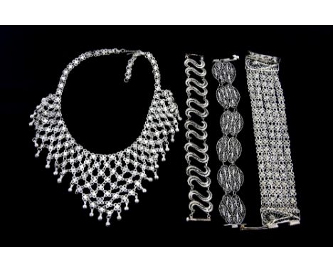 Group of  mainly Indian filigree jewellery, in white metal and silver gilt, 1930's- 1950's  .   