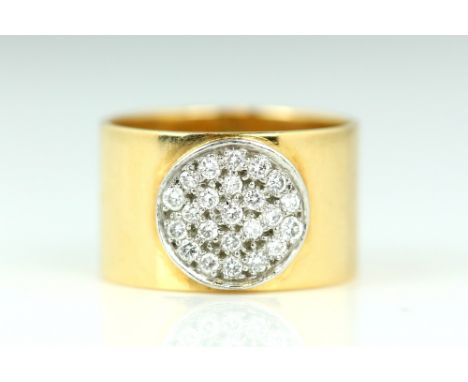  Jean Dinh Van,  an 'Anthea' design ring , with central diamond pave set circular panel, estimated total diamond weight 0.23 