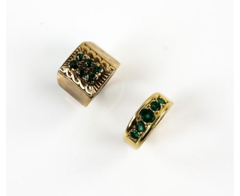 Two rings, emerald five stone ring, mount testing as 18 ct, ring size G and a a vintage green paste set ring, size F, set in 