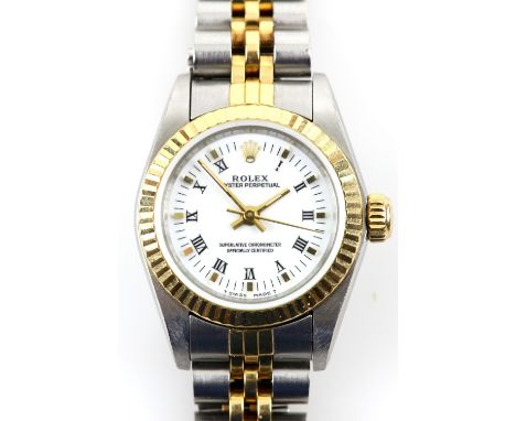 Rolex ladies Oyster perpetual Reference 6700  wrist watch the steel case with gold fluted bezel and crown, the signed  white 