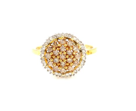 Contemporary diamond cluster ring, nineteen round brilliant cut yellow diamonds, surrounded by a border of round and baguette