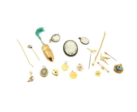 A  mixed group of jewellery, a tennis racket brooch, turquoise and wish bone stick pin, round pendant, all testing as 18 ct, 