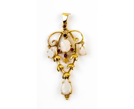 Openwork Edwardian style opal and ruby pendant, with three drops and leaf decoration, 9 ct.   Good condition, gross weight 4.