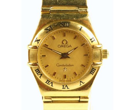 Omega a Ladies Constellation gold dress watch ,reference 553/865  the signed  gold  dial with hour batons, flanked by a fixed