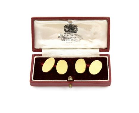 A pair of engine turned oval cufflinks, with chain link connections, in 18 ct yellow gold, hallmarked Birmingham, in Asprey &