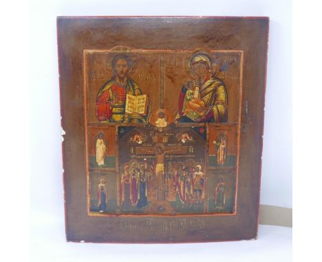 A Russian icon depicting the crucifixion of Christ flanked by angels and saints, with Christ Pantocrator and the 'Mother of G