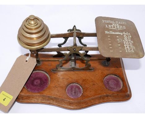 A set of early 20th century postal letter scales 