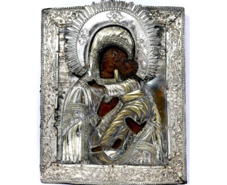 A Russian icon, the Mother of God of Korsun, tempera on wood panel, in silver and silver plated oklad, bears hallmark, 32 x 2