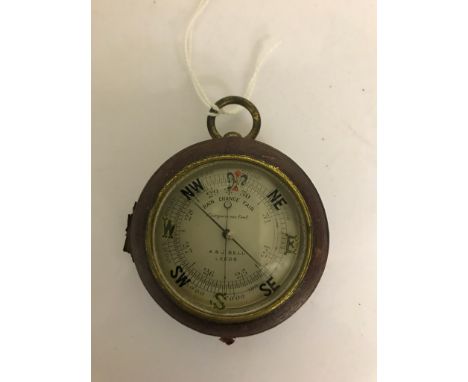 A 19th century cased hand barometer, with compass set to the outer case