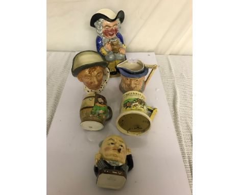 A quantity of Toby Jugs to inc a Clarice Cliff example