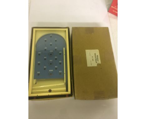 A boxed miniature bagatelle