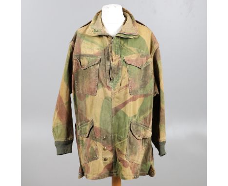 A Denison Smock with label 'Smocks Denison Airborne Troops Size 4, Height 5 ft 6 ins - 5 ft 8 ins Breast 39 ins - 41 ins Geo.