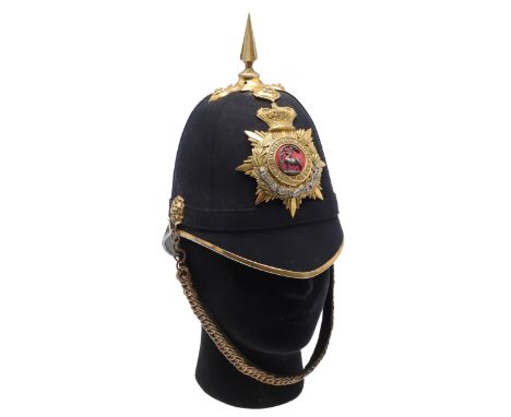 With a blue cloth covered body with brass fittings, six sided spike to the top on boss with foliate fixings, rosettes to eith