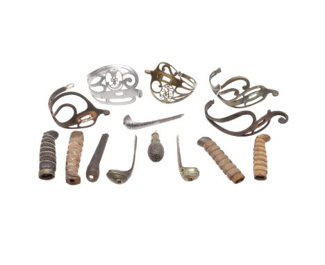 A useful collection of sword furniture including a Light Infantry guard, a Victorian guard, various grips, back straps and ot